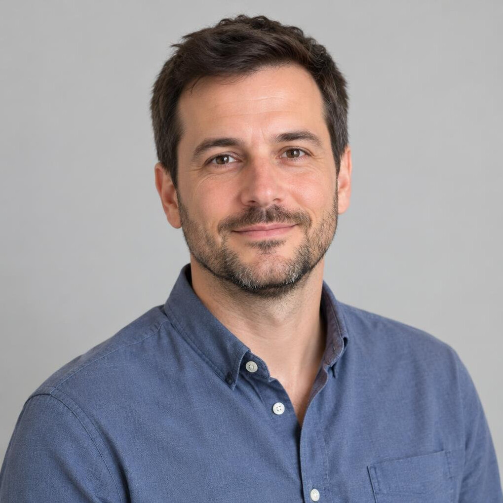Portrait of a bearded man in a casual shirt