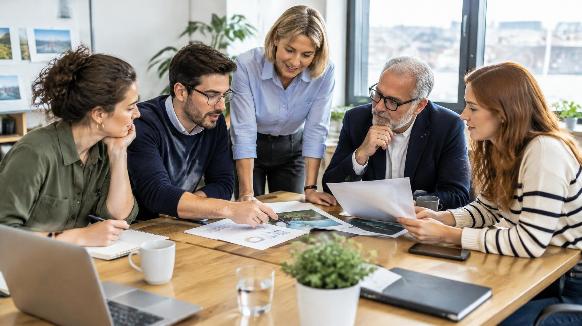Colleagues discussing around a table