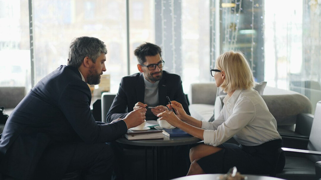 team discussing emerging jobs